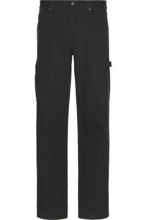 Dickies Relaxed Fit Duck Jean in - Black. Size 34x32 (also in 36, 38x32).