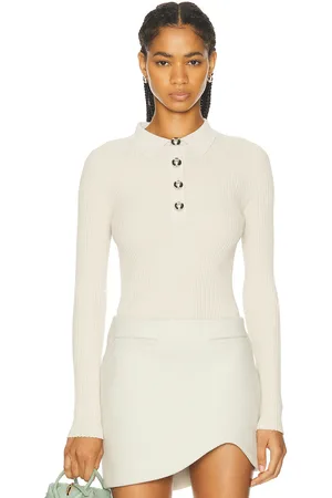 Ila Mn Polo Neck Ribbed Knit Top in - Beige. Size 34 (also in 38, 40).