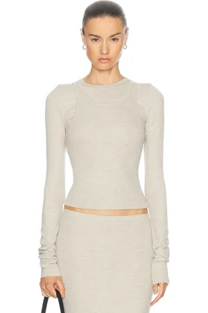 ÉTERNE Long Sleeve Fitted Top in - Beige. Size L (also in XL).