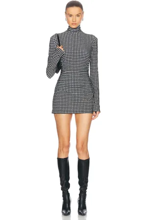 Norma Kamali Long Sleeve Turtleneck Pickleball Dress in - Black. Size L (also in M, S, XL, XS).