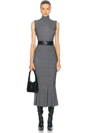 Norma Kamali Sleeveless Turtleneck Fishtail Dress in - Black. Size L (also in M, S).
