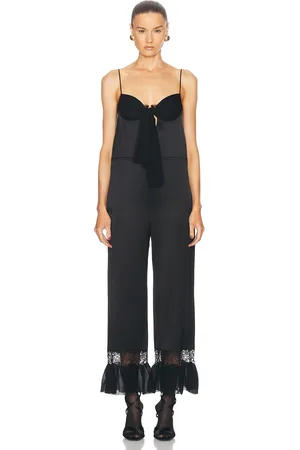 Saint Laurent Flare Leg Jumpsuit in - Black. Size 36 (also in 40, 42).