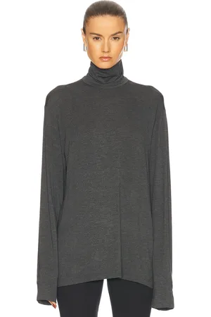 Norma Kamali Long Sleeve Turtleneck Easy Fit Top in - Charcoal. Size XS (also in ).