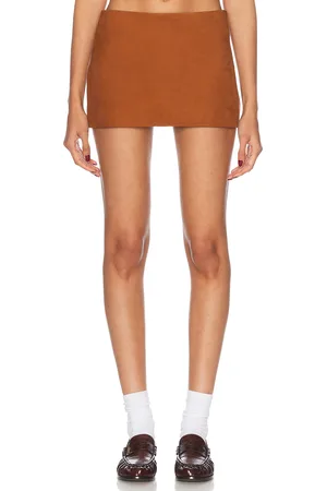 MIMCHIK Curved Mini Skirt in - Brown. Size 6 (also in 2, 4).