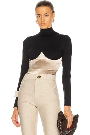FLEUR DU MAL Mock Neck Long Sleeve Bodysuit in - Black. Size S (also in XS).