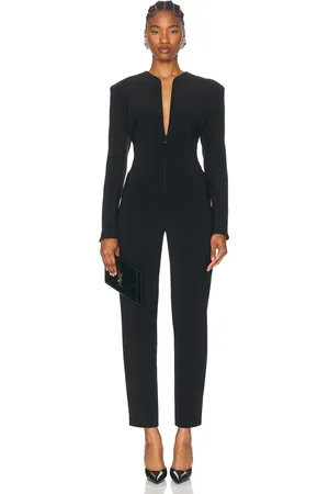 Norma Kamali Long Sleeve Shoulder Pad V Neck Zip Front Tapered Leg Jumpsuit in - . Size S (also in XS).