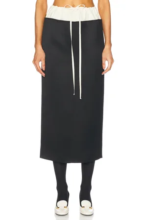 Khaite Chet Skirt in - Black. Size 6 (also in 8).