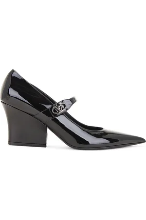 VALENTINO GARAVANI V Logo 75 Lockette Mary Jane Pump in - Black. Size 36 (also in 36.5, 37.5, 38, 38.5, 39.5, 40, 41).
