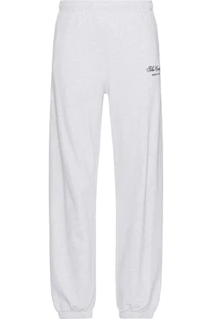 Sporty & Rich X Hotel Carlyle Script Sweatpant in - Light Grey. Size L (also in M, XL/1X).