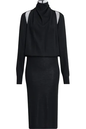 Alaïa Cut Out Long Sleeve Dress in - Black. Size 34 (also in 36, 38).