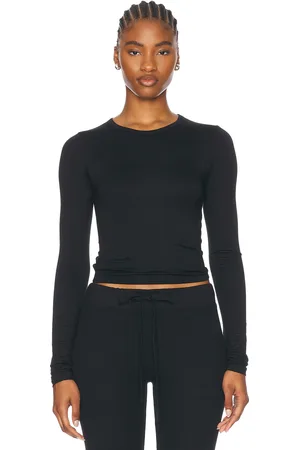 ÉTERNE Fitted Crewneck Long Sleeve T-Shirt in - . Size L (also in M, S, XL, XS).