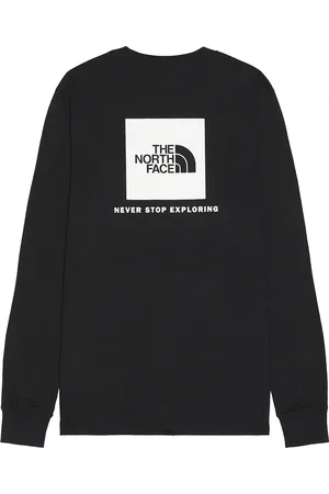 The North Face Long Sleeve Box NSE Tee in - Black. Size L (also in M, S, XL/1X).