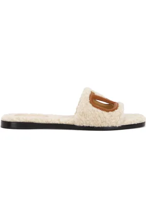 VALENTINO GARAVANI V Logo Cut Out Slide in - Ivory. Size 36.5 (also in 37, 37.5, 38, 38.5, 39, 39.5, 40, 41).
