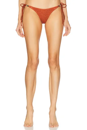 Bond Eye Beaded Tie Side Vista Brief Bikini Bottom in - Rust. Size all.
