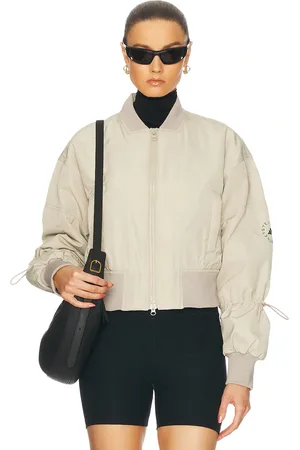 adidas Truenature Cropped Bomber Jacket in - Taupe. Size L (also in M, S, XS).