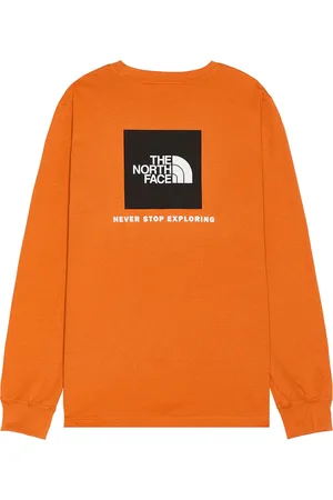 The North Face Long Sleeve Box NSE Tee in - Orange. Size L (also in M, S, XL/1X).