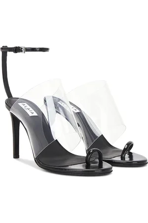 Alaïa Asymmetric Sandal in - Black. Size 36 (also in 39, 41).