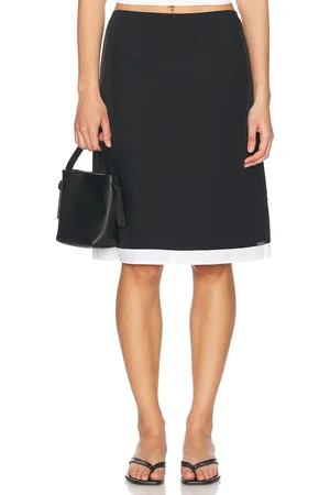 Simkhai Aubria Skirt in - Black. Size L (also in S, XS).