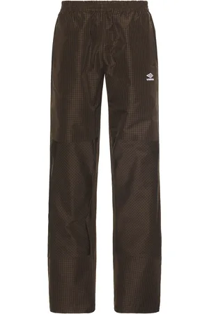 Umbro Mini Check Double Knee Pants in - Brown. Size M (also in ).