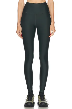 alo High Waist Airlift Legging in - Dark Green. Size S (also in ).