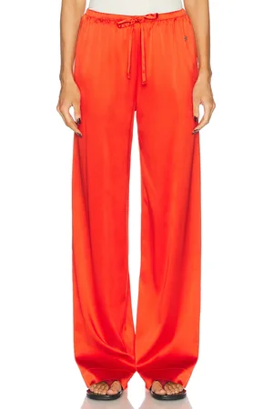 ÉTERNE Brody Silk Pant in - Red. Size L/XL (also in M/L).