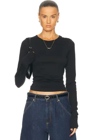 ÉTERNE Fitted Crewneck Long Sleeve Top in - . Size L (also in M, S, XL, XS).