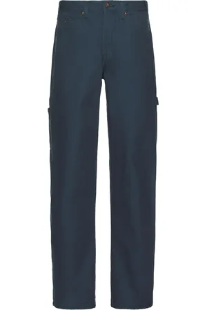 Dickies Relaxed Fit Duck Jean in - Blue. Size 30 (also in 32, 34, 36).