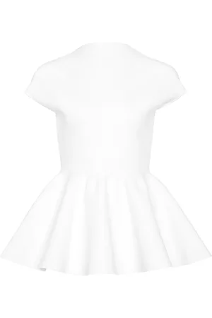 Alaïa Peplum Top in - White. Size 38 (also in ).
