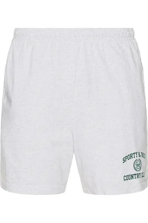 Sporty & Rich Varsity Crest Gym Short in - Light Grey. Size L (also in M, S, XL/1X).