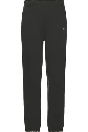 alo Accolade Sweatpant in - Dark Green. Size L (also in M, S, XL/1X).