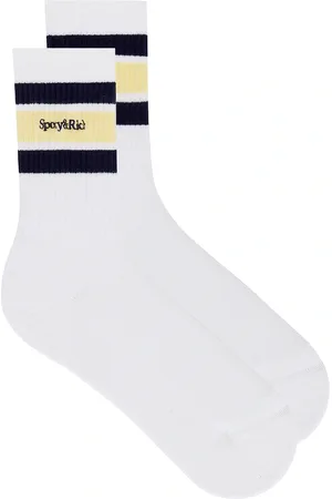 Sporty & Rich Serif Logo Socks in - . Size all.
