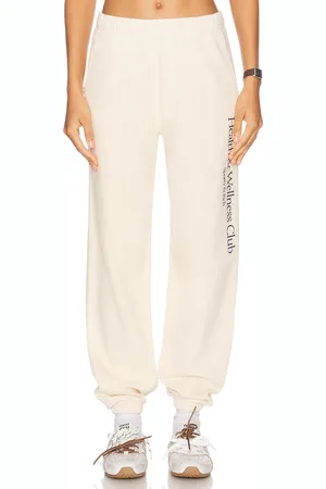 Sporty & Rich Health & Wellness Crest Sweatpant in - . Size L (also in M, S, XL, XS).