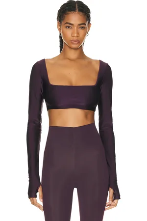 The Andamane Nyla Crop Top in - Black. Size XS (also in ).