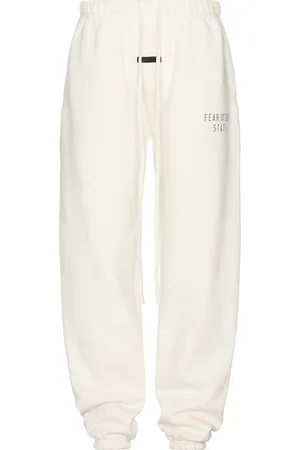 FEAR OF GOD Fleece Essential Sweatpant in - Cream. Size M (also in ).