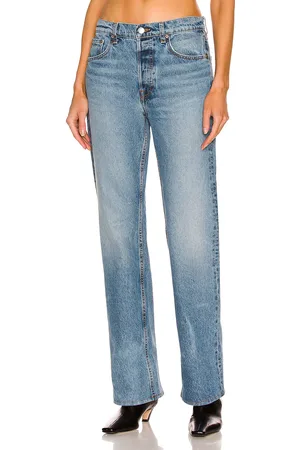 GRLFRND Courtney Low Rise Boot in - Denim-Medium. Size 31 (also in ).