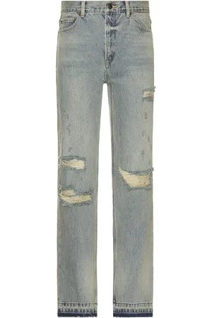 Midnight Distressed Denim Jeans in - Blue. Size 30 (also in 32, 34, 36).