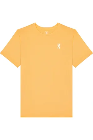 On Running Core-T in - Orange. Size M (also in S, XL/1X).