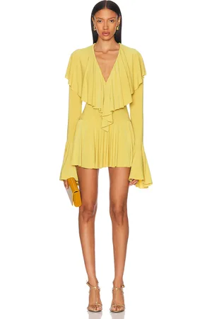 Norma Kamali Long Sleeve Deep V Ruffle Mini Dress in - Mustard. Size M (also in ).