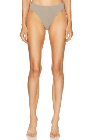 Totême Smocked Mid Rise Bikini Bottom in - Grey. Size M (also in ).