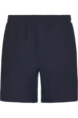Beyond Yoga Take It Easy Shorts in - Navy. Size L (also in M, S, XL/1X).