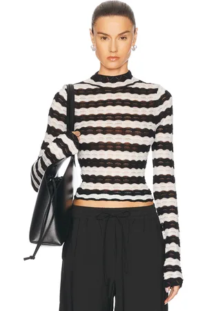 Dagmar Lace Knit Top in - Black. Size L (also in M, S, XS).
