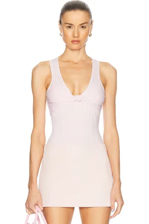 FLEUR DU MAL Wrap Tie Bodysuit in - Blush. Size XS (also in ).
