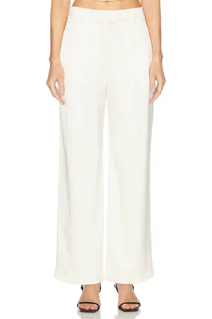 FLEUR DU MAL Satin Relaxed Pant in - Ivory. Size 2 (also in 6, 8).