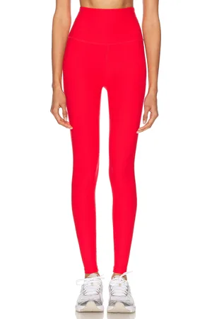 Beyond Yoga Spacedye Caught in The Midi High Waisted Legging in - Red. Size L (also in M, S, XS).