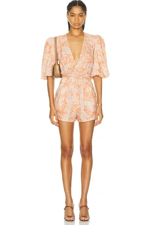 Adriana Degreas Bulles De Mer Puff Sleeved Playsuit in - Peach. Size L (also in S).