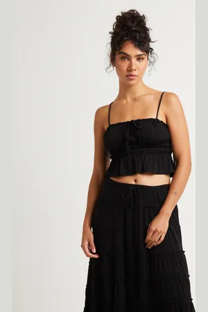 Subtitled Sereno Peplum Top