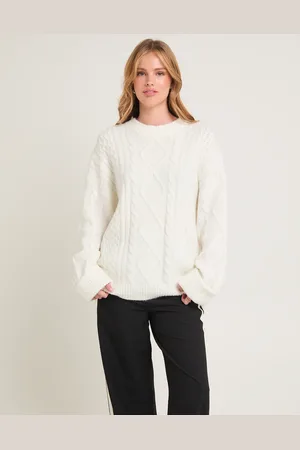 Subtitled Clara Cable Knit Sweater