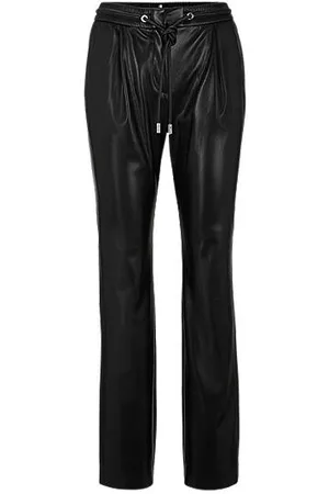 HUGO - Logo-embossed relaxed-fit trousers in faux leather