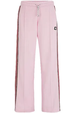 HUGO - Monogram-print tracksuit bottoms with striped tape