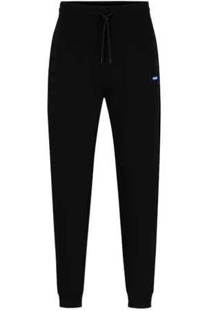 HUGO BOSS Cotton-terry tracksuit bottoms with blue logo patch